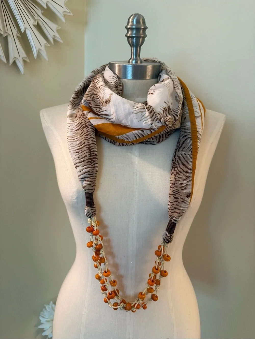 Cream and Brown Patterned Infinity Scarf with Orange Bead Accents